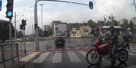 Video: Good guy biker escorts elderly man across busy road