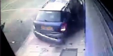 Video: Woman cheats almost certain death as car mounts pavement & plunges into lamp post beside her