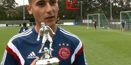 Video: Ajax player receiving goal of the month award upstaged by ‘keeper scoring amazing diving header in the background