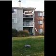 Video: This could be the greatest way of moving a couch from the balcony of a three storey house ever
