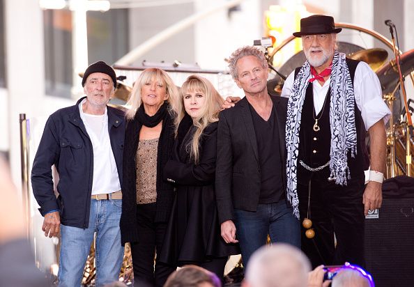 NEW YORK, NY - OCTOBER 09:  (L-R)  John McVie, Christine McVie, Stevie Nicks, Lindsey Buckingham and Mick Fleetwood of Fleetwood Mac pose on stage on NBC's "Today" at the NBC's TODAY Show on October 9, 2014 in New York, New York.  (Photo by Noam Galai/Getty Images)