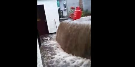 Video: Scary footage of a flash flood crashing into a house in Newry yesterday