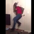 Video: English international rugby player running through a door at a house party