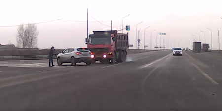 Video: Russian pedestrian gets caught in the middle of nasty crash