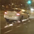 Video: Driver tears up road while driving on three wheels