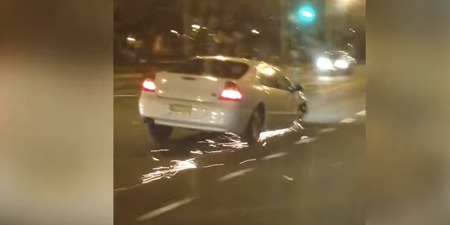 Video: Driver tears up road while driving on three wheels