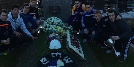 Pic: Kerry club honour the memory of late teammate by visiting his grave after county title win