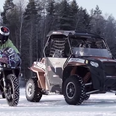 Video: A motorbike and ATV drift around a frozen lake in this incredible display of driving