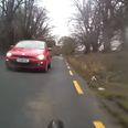 Video: Scary footage of a cyclist in Wexford almost getting hit by a car