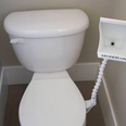 Pic: All those arguments about putting the toilet seat down might finally be over with this invention