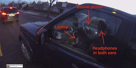Video: Worst driver EVER caught using mobile phone & laptop while wearing headphones