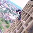 Video: Base jumpers film a race to the top of a tower block and back down again