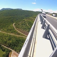 Video: Ballsy BASE jumper leaps off bridge from moving van