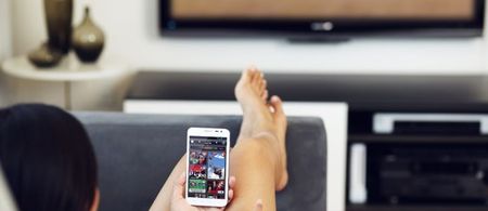 Using your phone while watching TV is making you more stupid, according to new research