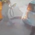 Video: Woman sets fire to a petrol pump while a man is using it in this incredible footage