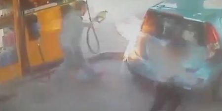 Video: Woman sets fire to a petrol pump while a man is using it in this incredible footage