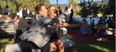 Video: Brave man actually slaps the bridal bouquet away from his girlfriend before she catches it