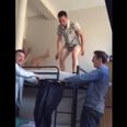 Video: Kilkenny man on Edinburgh stag tries to leap off bunkbed into a pair of trousers held by two mates