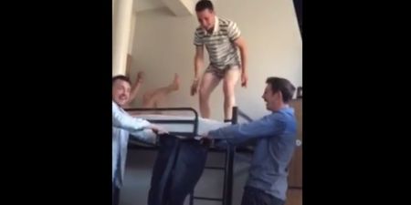 Video: Kilkenny man on Edinburgh stag tries to leap off bunkbed into a pair of trousers held by two mates