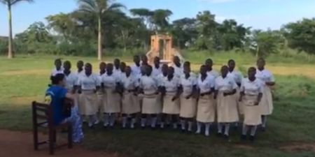 Video: An Irish teacher and 24 students from Uganda brilliantly singing a huge Bob Dylan song