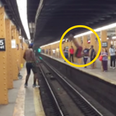 Video: Guy tries to jump across subway track and fails spectacularly