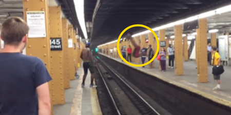 Video: Guy tries to jump across subway track and fails spectacularly