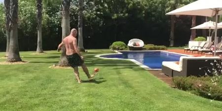 Video: A topless Alan Shearer hits a long-range target with a ping of a shot on holiday