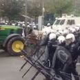 VIDEO: A water cannon completely blowing away a tractor at a protest