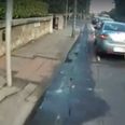 VIDEO: A cyclist in Dublin rams into the back of a car and leaves massive dent