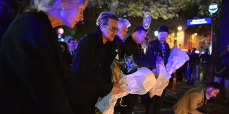 PICS: U2 lay wreaths at shrine near the scene of the Paris attacks