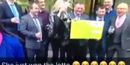 VIDEO: Lotto winner sprays herself in the face with champagne on Six One news