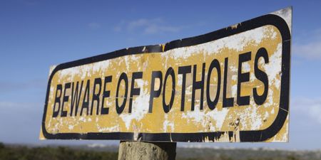 PICS: Giant Cork pothole attempts to swallow Renault whole
