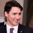 PIC: Canadian Prime Minister Justin Trudeau photobombs students’ graduation photo