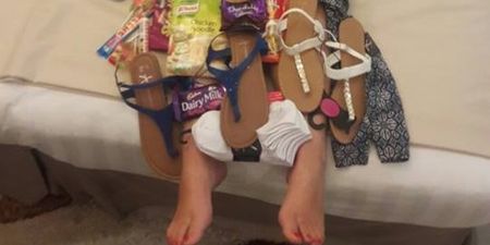 PIC: Clare girl abroad literally wears the absolute motherload of Irish treats sent from home