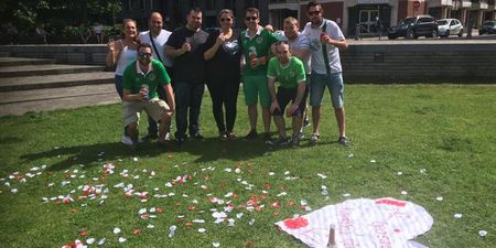 PIC: Irish fans drink cans in a Lille park while an Italian couple get engaged