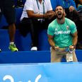 WATCH: Husband goes absolutely cracked cheering on Olympic swimmer