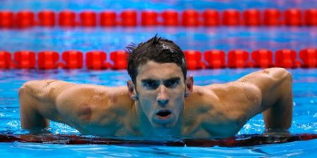 WATCH: Commentator makes a horrendous balls-up as Michael Phelps wins gold