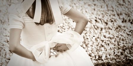 PIC: Young fella has no Halloween costume, so trolls his sister by wearing her communion dress