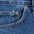 Here’s why you have that tiny button on your jeans