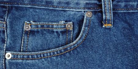 Here’s why you have that tiny button on your jeans