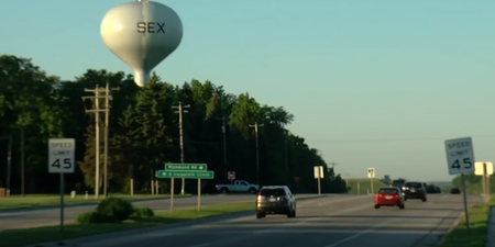 A halt in the re-painting of a water tower results in town greeting visitors with the word sex
