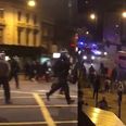 Fireworks and bottles thrown at riot police at East London death protest