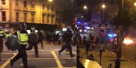 Fireworks and bottles thrown at riot police at East London death protest