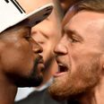WATCH: Conor McGregor was seriously pumped up as he faced down Floyd Mayweather at the weigh-in