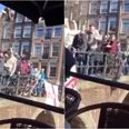 WATCH: English fans filmed launching full cups of booze onto boatful of people and diving into canal in Amsterdam