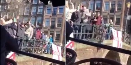WATCH: English fans filmed launching full cups of booze onto boatful of people and diving into canal in Amsterdam