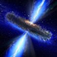 Scientists have discovered a black hole so large that it is pulling on the fabric of space and time