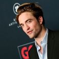 Here’s your very first red-tinted look at Robert Pattinson as Batman