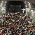Photos show 640 Afghans crammed into fleeing US Air Force plane