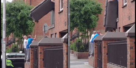“Only in Dublin” – Viral clip sees three men remove sofa from window with sweeping brushes